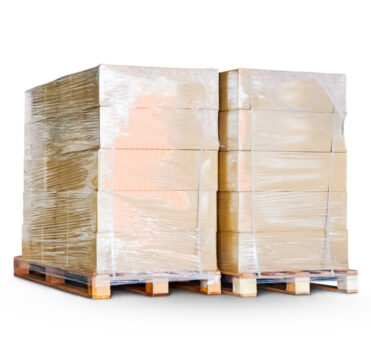 package-boxes-wrapped-plastic-stacked-pallets-bulk-pallets-isolated-white-background